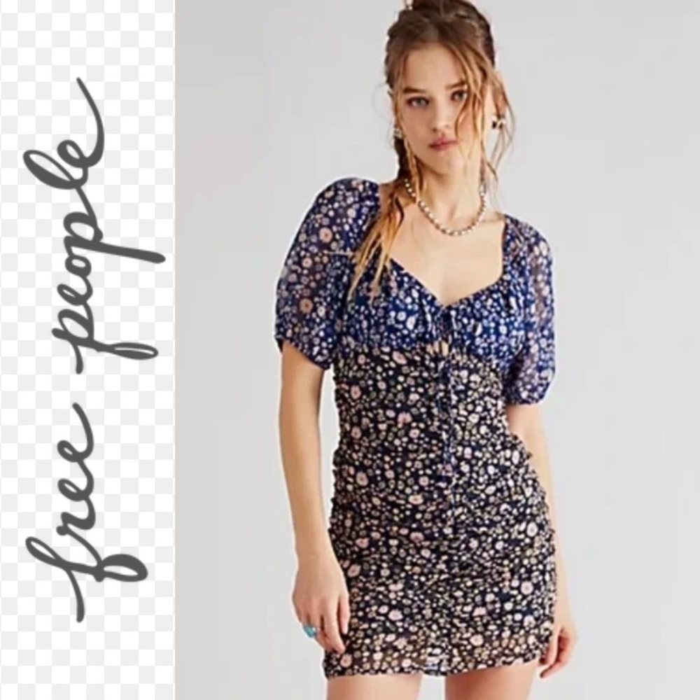 NWOT  Free People Tessa Dress. Size Small. Color is Night Combo